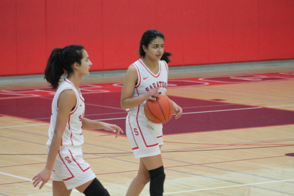 Co-captains junior Zinneerah Ahmed and senior Tanya Ghai command the court during the Lynbrook game.