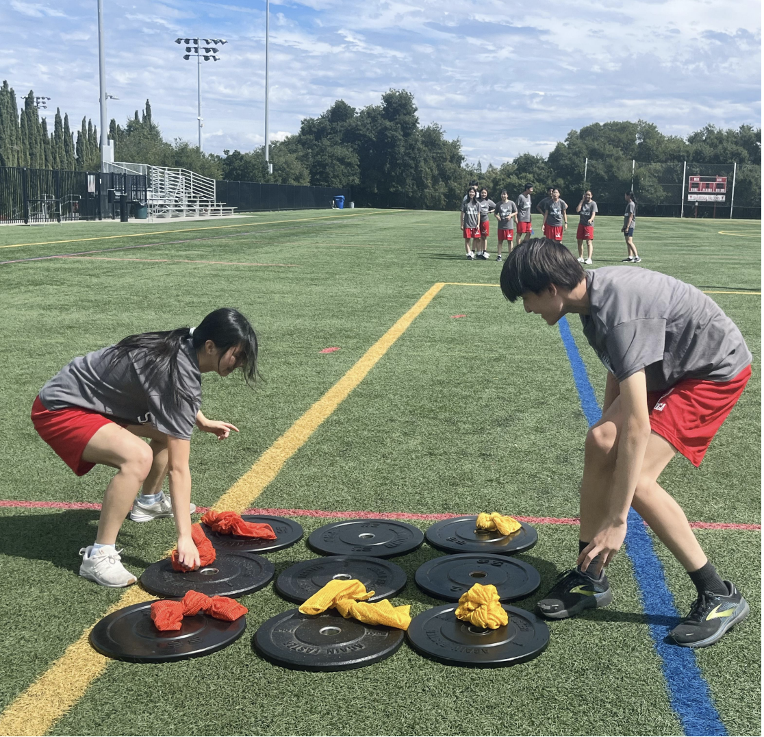 Freshmen Delsin Dizoglio and Kaylee Ren play physical tic-tac-toe in period 6 P.E.