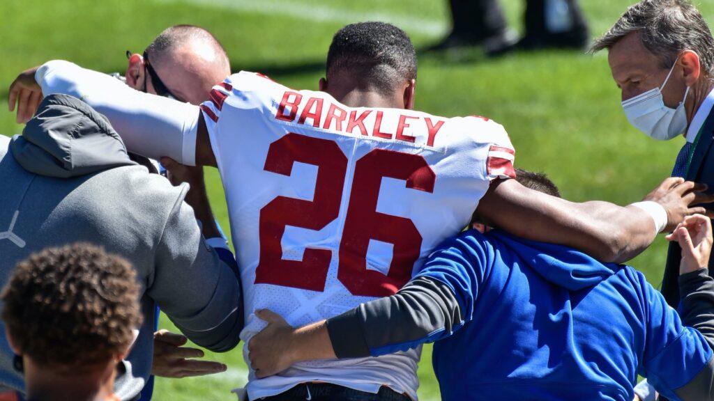 <p>Superstar running back Saquon Barkley of the New York Giants is helped off the field after suffering an ACL tear.</p>
