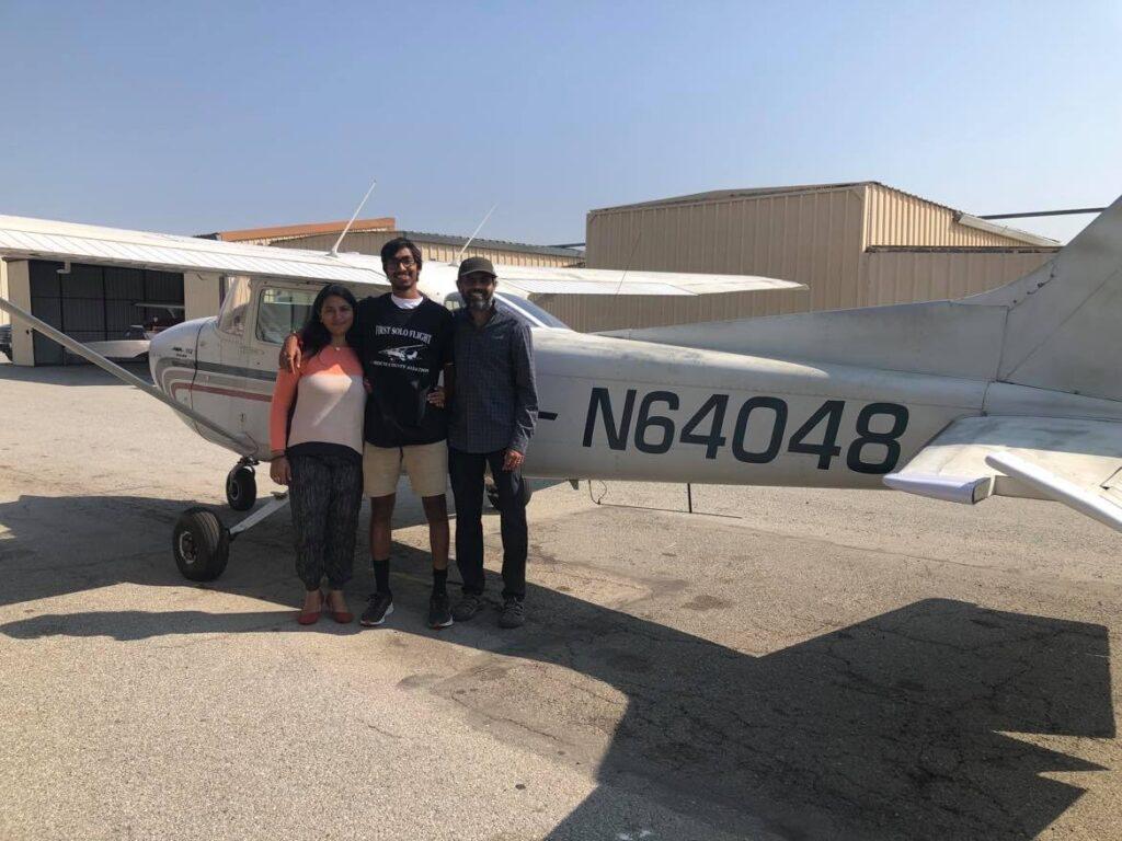 Omkar Kulkarni and his parents posted in front of Kulkarni’s solo jet after finishing his three consecutive 7-minutes solos in the South County Aviation flight school at San Martin, California. 