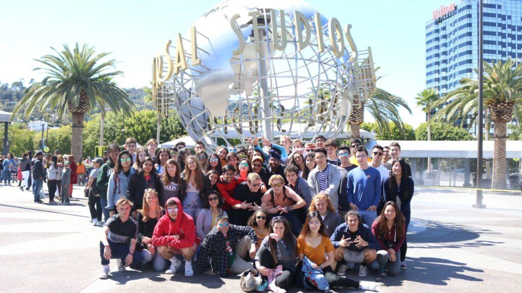 MAP 11 students pose in front of Universal Studios on a pre-pandemic field trip to LA.
