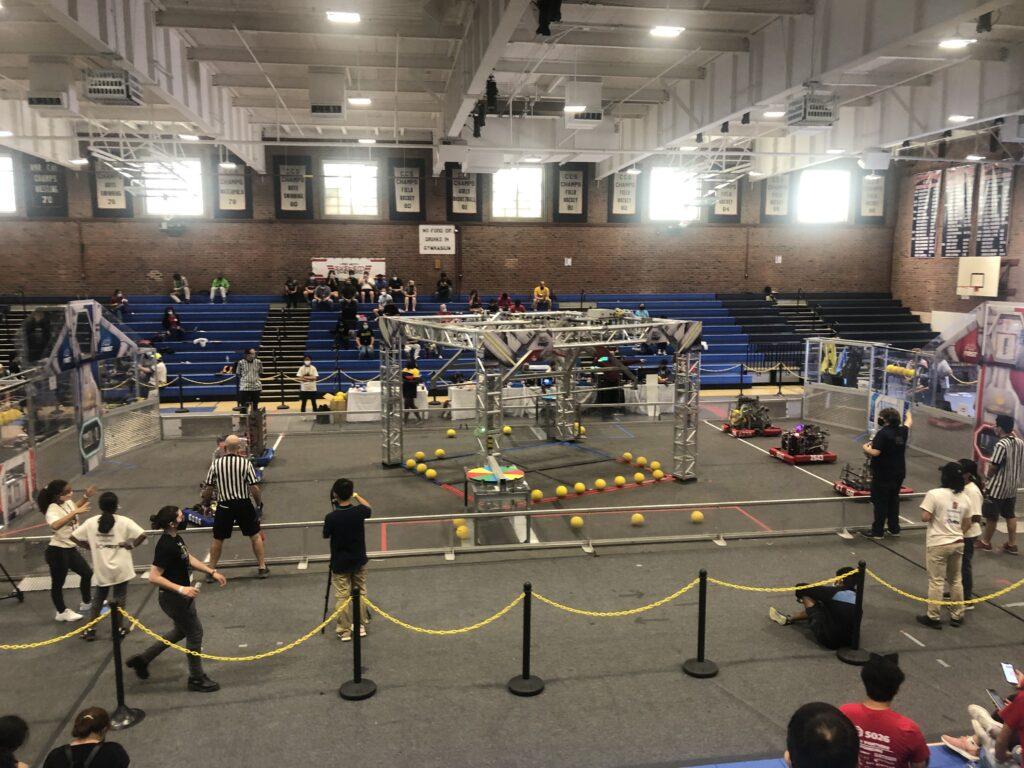 Teams get ready with their robots to begin their match