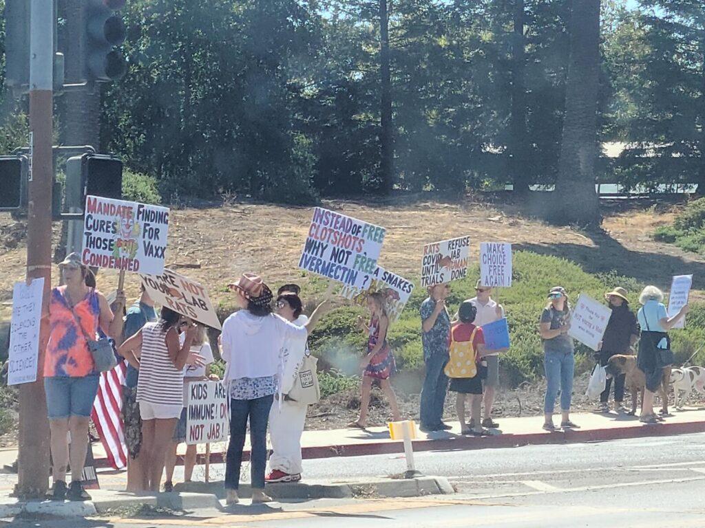 Protestors line up on Sept. 18 near West Valley College farmer’s market.

