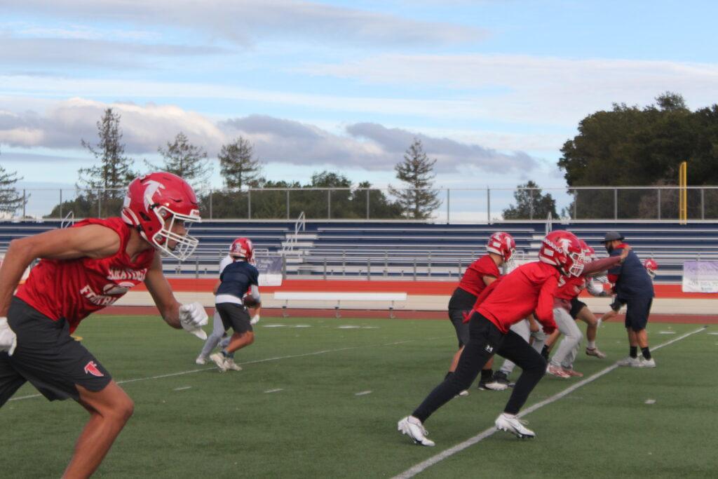 The football team practices for upcoming games on Oct. 21