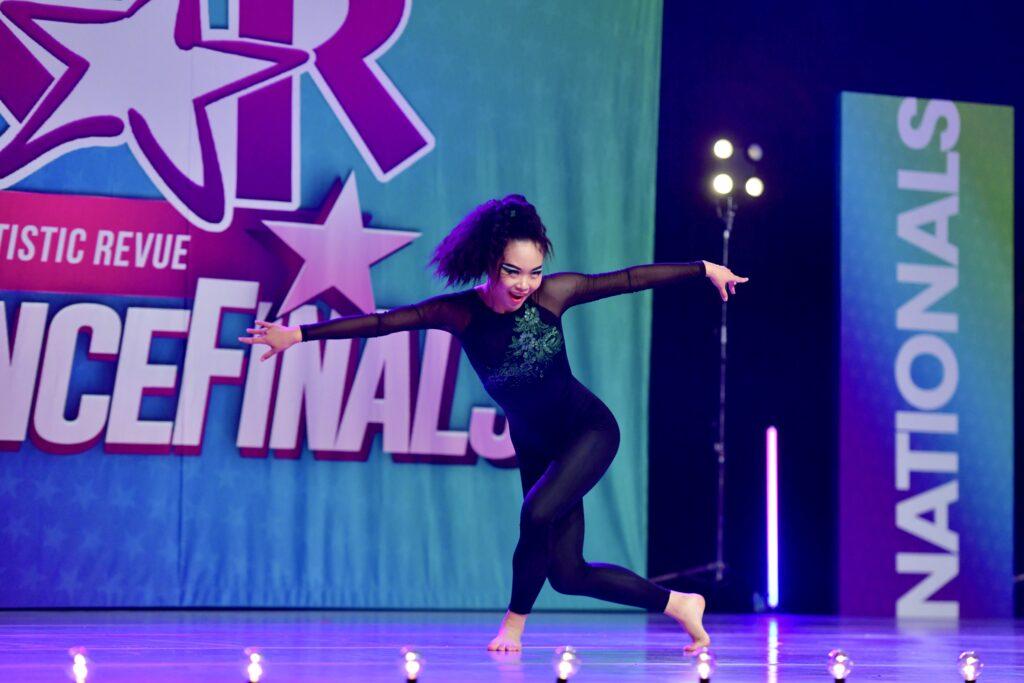 Me performing my solo “The Seed” at the Kids’ Artistic Revue (KAR) National Title Competition in Las Vegas over the summer 