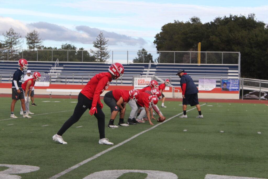 The football team practices at the field on Oct. 21