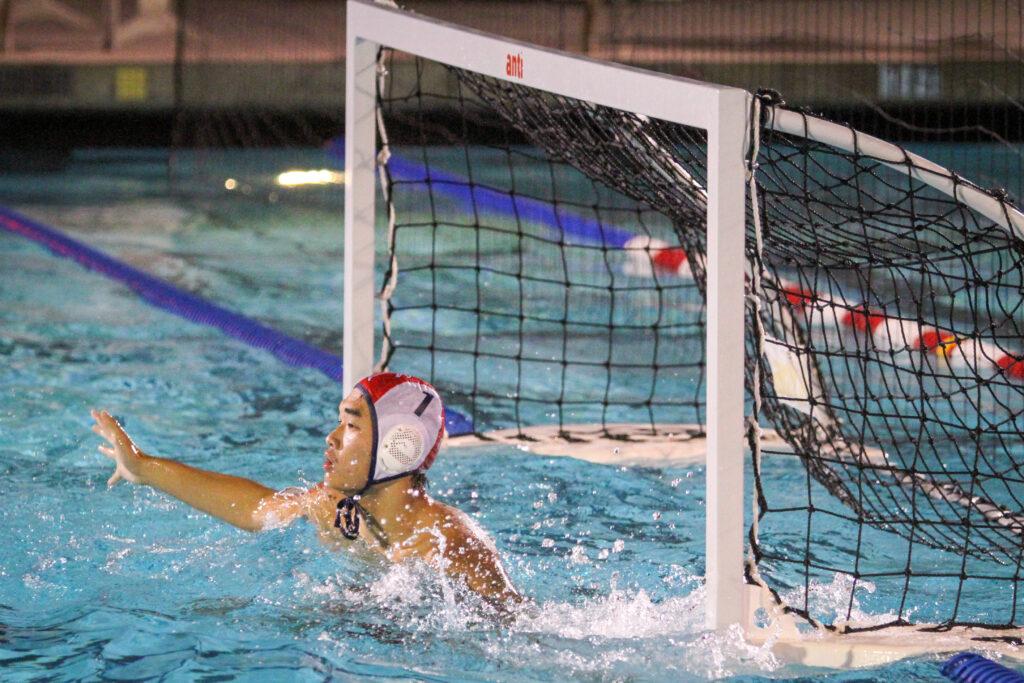 Senior Andrew Hong defends the goal at the team’s last game against Lynbrook on Oct. 29. The Falcons ultimately lost 8-7.