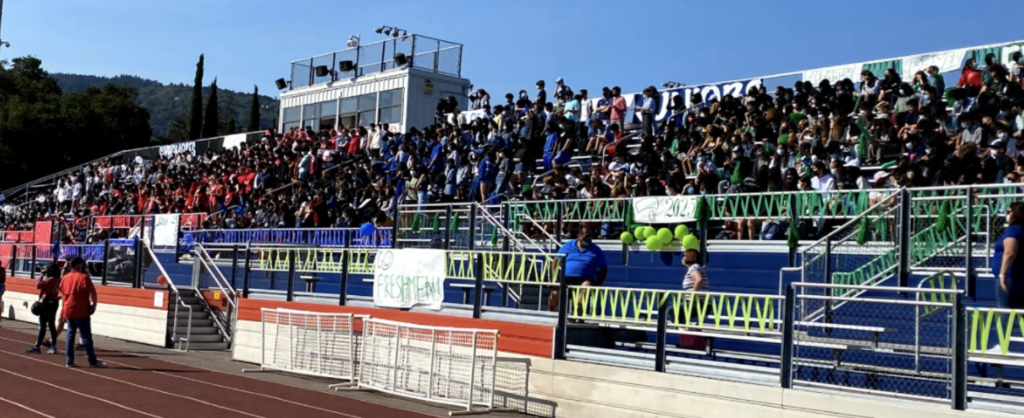 Students (left to right: sophomores, seniors, juniors, freshmen) arranged on the bleachers during the rally on Sep. 17.