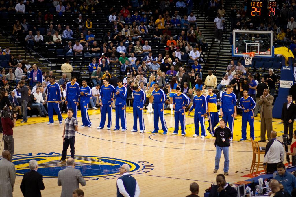 Warriors+starting+lineup+stands+before+game.