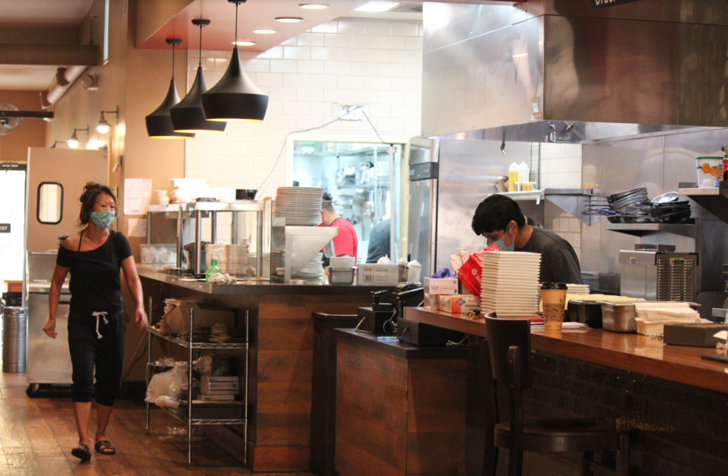 Interior view of Big Basin Burger Bar in the early days of the pandemic, captured by the writer during her first time reporting for the Falcon

&nbsp;