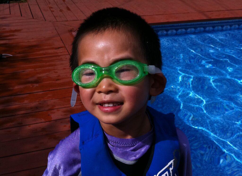I+first+started+learning+to+swim+in+the+small+pool+in+my+backyard.+