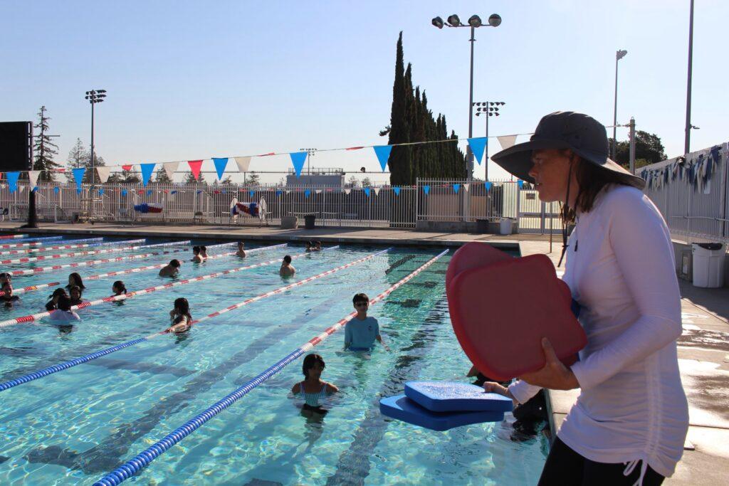 Liz Alves teaches her Intermediate P.E. class during their swimming unit