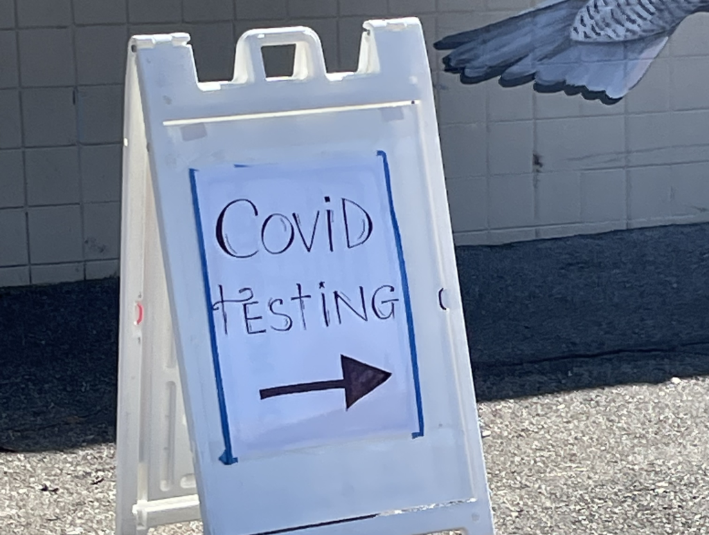 Sign pointing to the COVID testing stations
