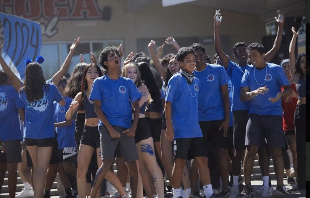 Juniors celebrate after a successful quad day performance