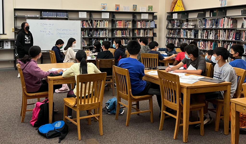 Blue group coach Victoria Hu lectures students at Redwood’s library during TJMC’s weekly meetings.