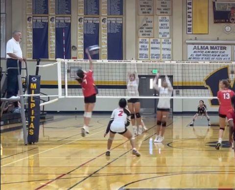 Freshman Jena Lew blocks the ball during a game against Milpitas on Sept. 22.