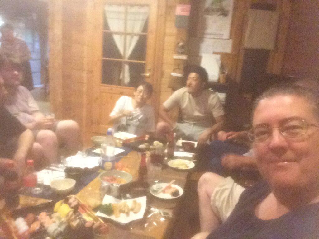 French+teacher+Elaine+Haggerty+and+her+family+enjoy+sushi+with+her+cousin+and+his+family+in+Japan.