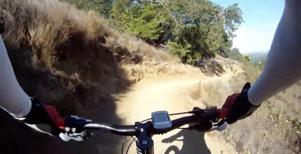 Math teacher PJ Yim bikes on a trail in Seven Springs Saratoga.