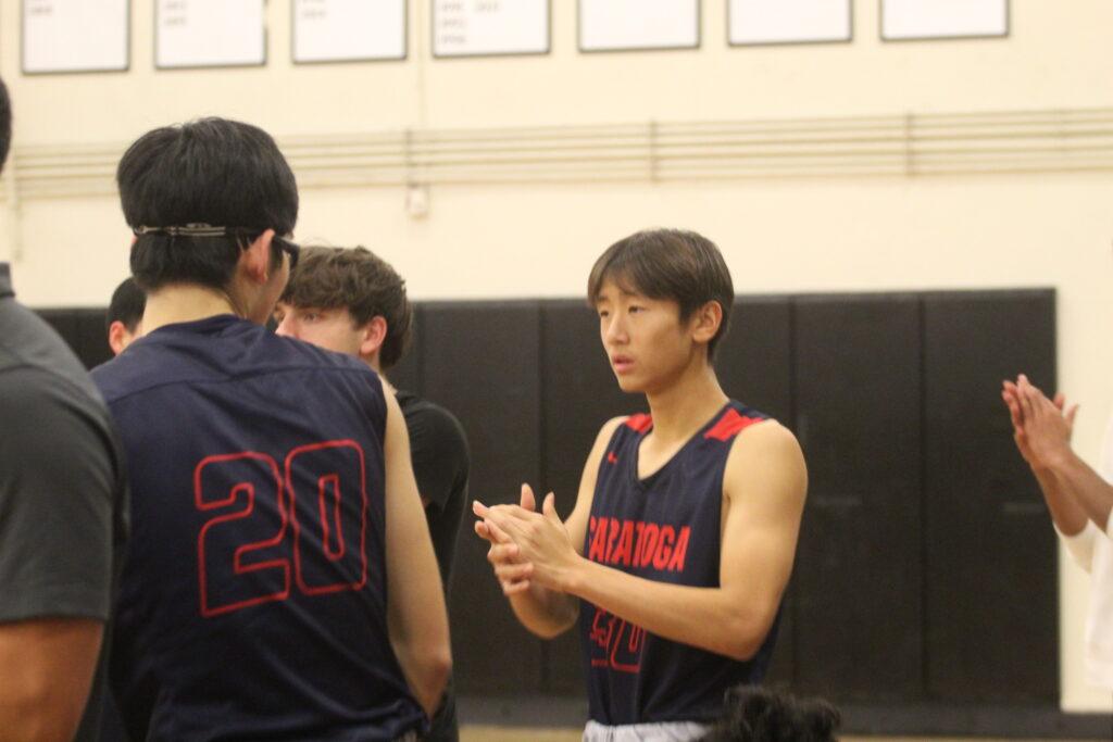 During a timeout in a Dec. 8 game against Branham, Steven Ning motivates his teammates.