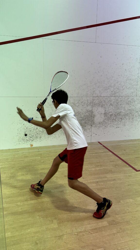 Playing+squash+at+the+national+level%2C+junior+Dhruv+Nemani+practices+countless+hours+every+week.