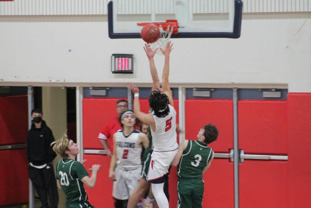 Senior point guard Nick Tjaden shoots a floater in the game against Palo Alto on Jan. 20.