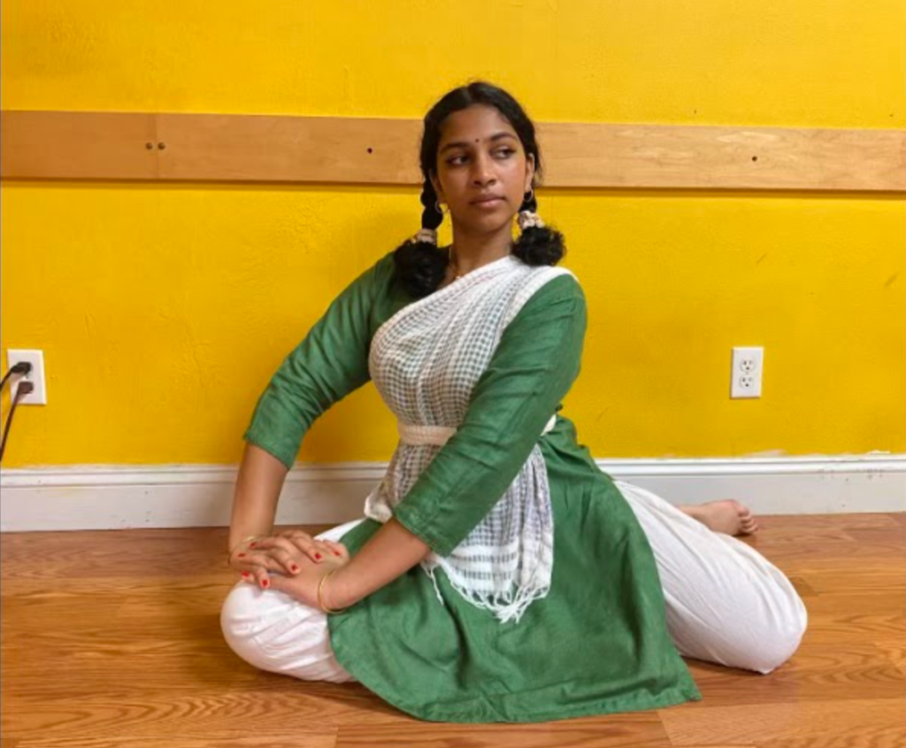 Sophomore Anika Ramakrishnan practices for her Arangetram with the accompaniment of carnatic music.