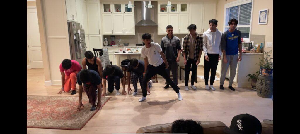 Senior Ojas Somani teaches the All-Males Dance (AMD) to members in preparation for their upcoming performance in BNB.
