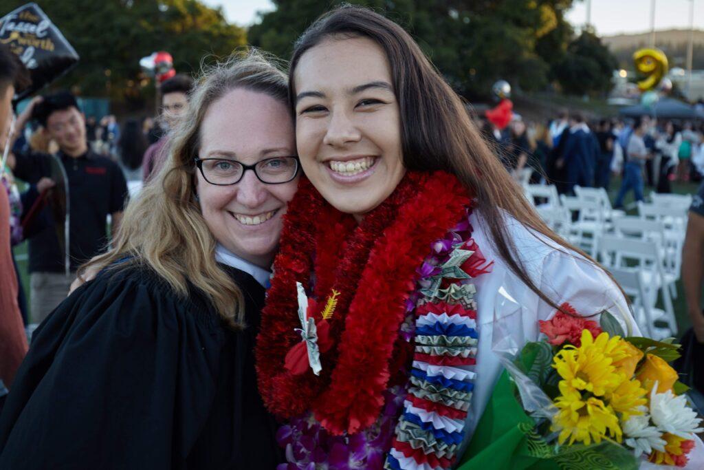 Class of ‘19 alumna Alex Ruemmler smiles for a picture with her junior year history teacher Faith Daly, who inspired her to become a teacher.