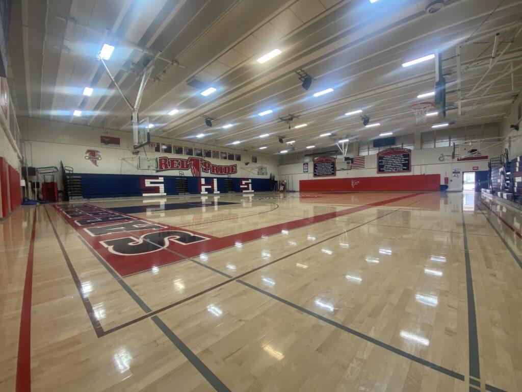 The condition of the school gym as of March 24.