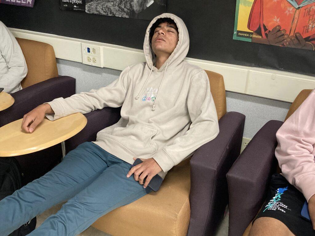 Junior Neal Malhotra catches some Z’s after a long night of playing brawl stars — he forgot to complete his history homework due that day.