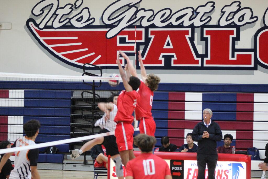 Junior Eric Norris and sophomore Ryan Backhus successfully block the ball and score a point against Los Gatos on May 3.