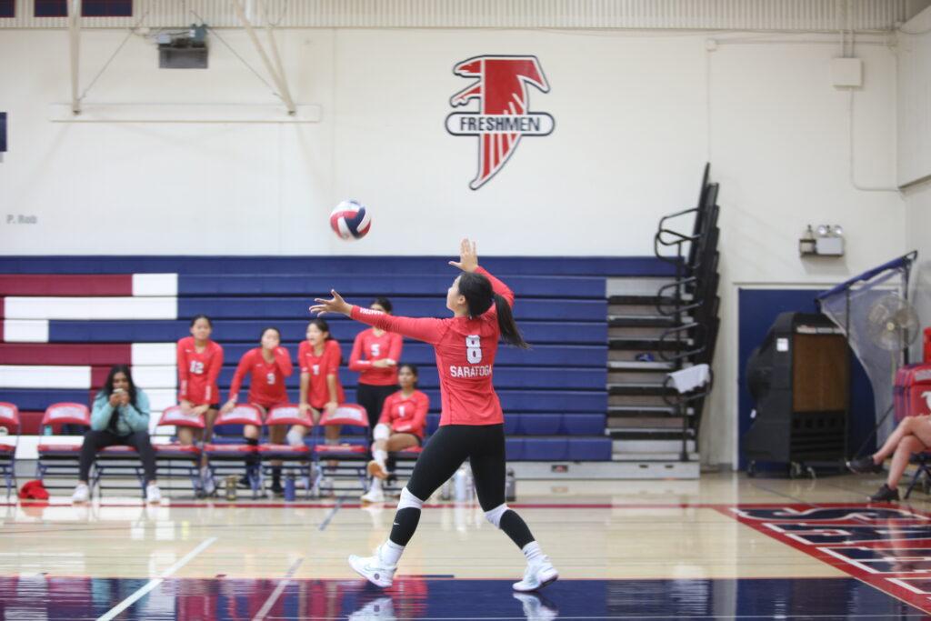 Outside hitter Emmy Pak mid-serve during the second of five games against Fremont on Sept. 14.