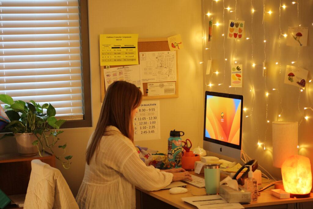 Greulich works in her office at the Wellness Center. 