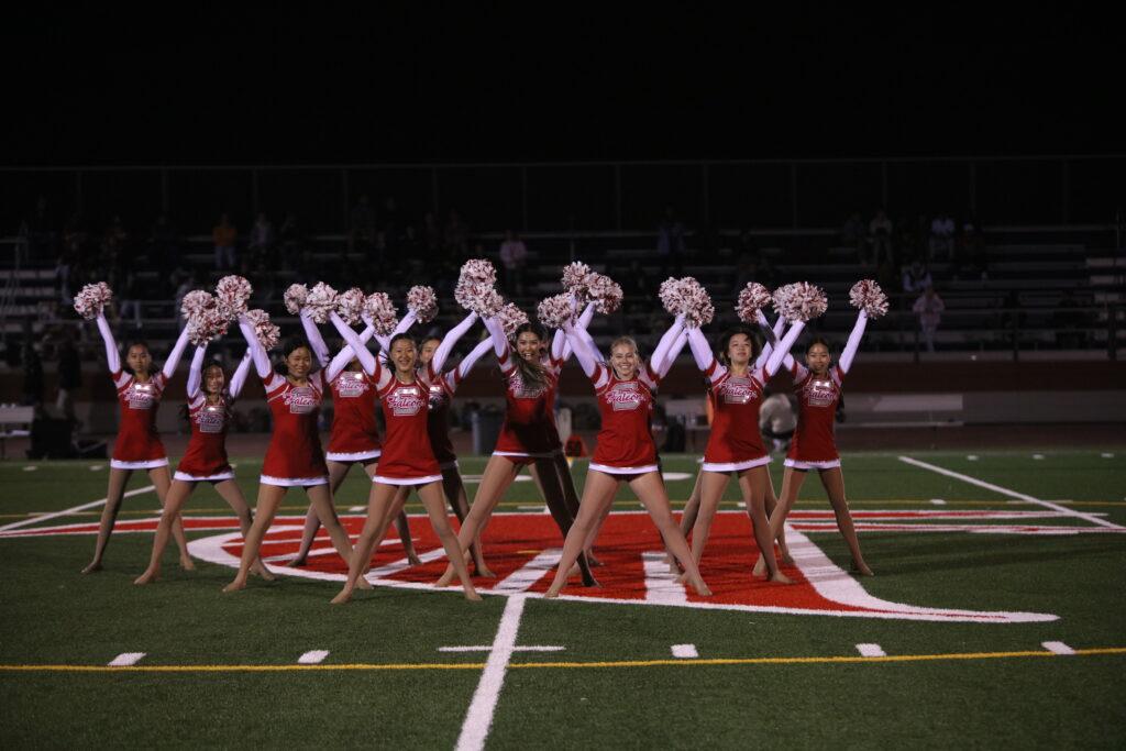 Dancers strike their starting pose at the Sept. 22 Homecoming football game.