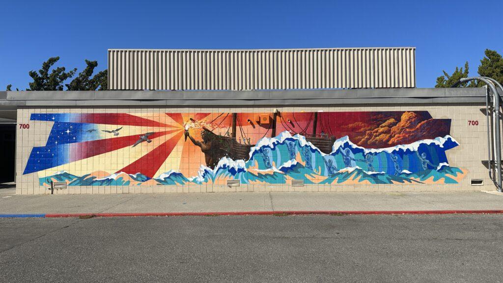 The completed mural on the backside of the 700 building.