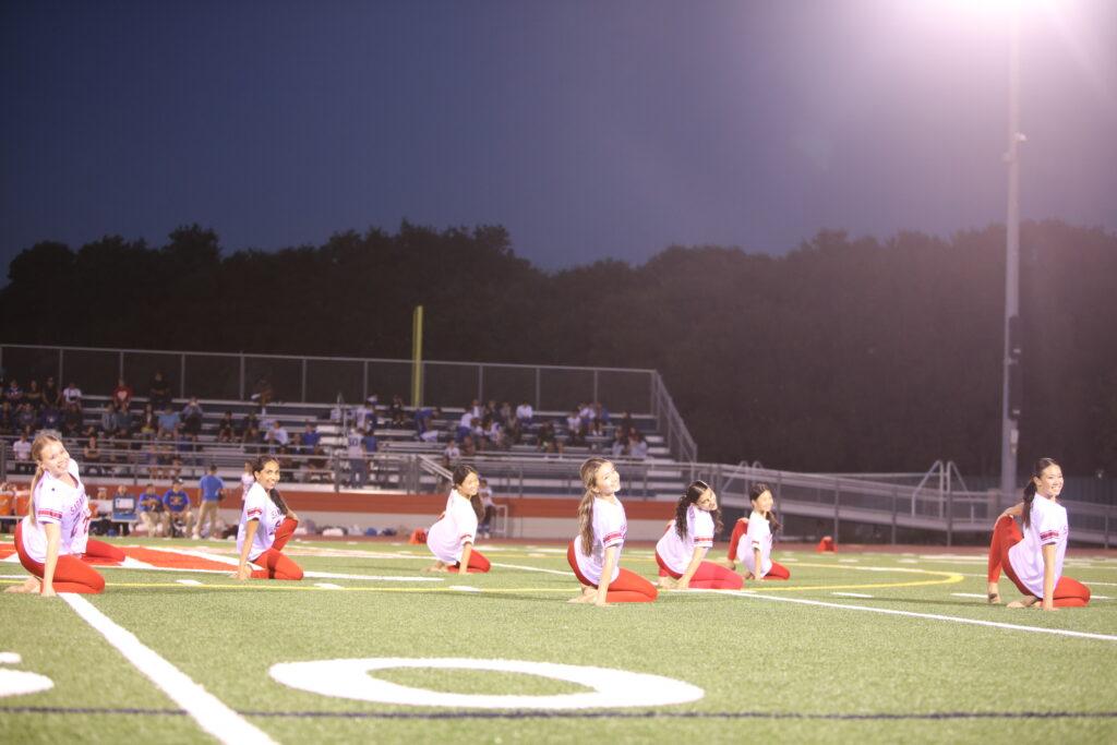 The dance team performs their hip-hop routine to the song “Hot in It” for the football game on Sept. 1.