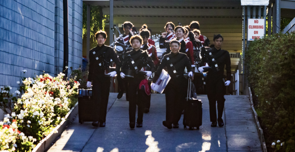 Junior Nathan Lee, senior Gabe Shyh, junior Aiden Chen and senior Cameron Nguyen lead the school’s Marching Band and Color Guard to the football field on Sept. 1, where they performed during halftime.