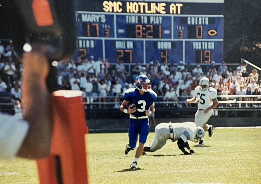 Ellis returns a punt during a 1992 game against the University of San Diego.