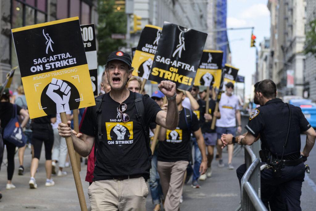 Members of SAG-AFTRA protest in front of Netflix and Warners Bro offices in New York on Aug 2nd.  