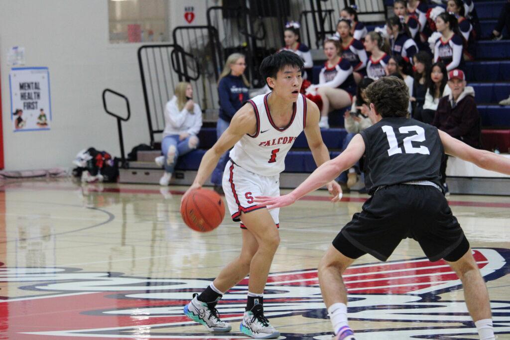 Senior Bryan Wang brings up the ball against Monta Vista during a match on January 16.