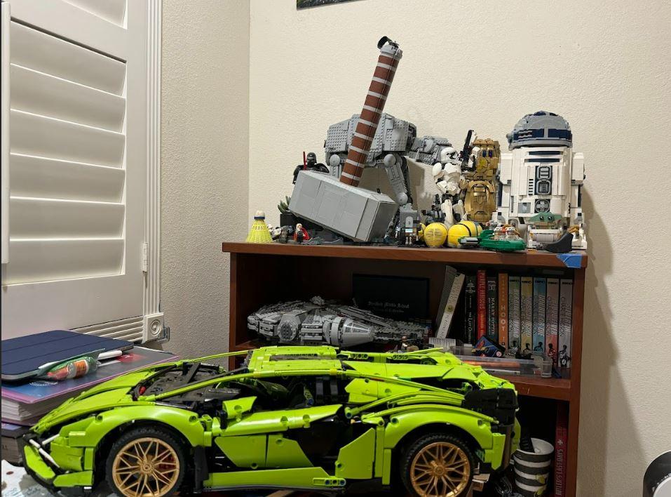 My beloved legos displayed on my bedroom shelf.
