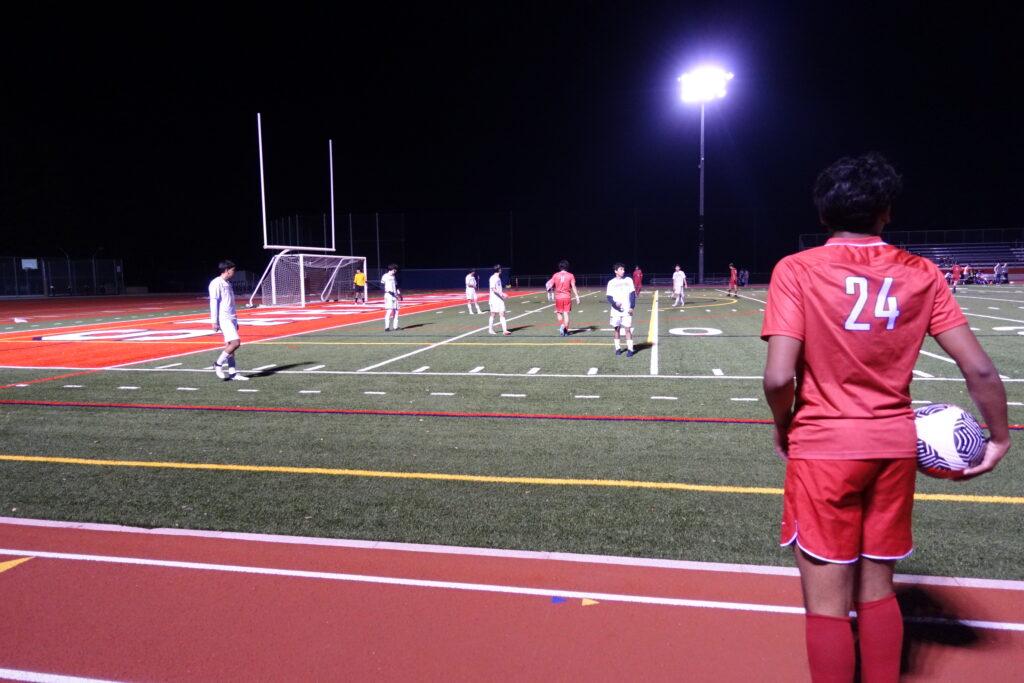 Right back Vihaan Bhaduri prepares to inbound the ball near the goal box on Cupertino’s side in Feb. 13 game.