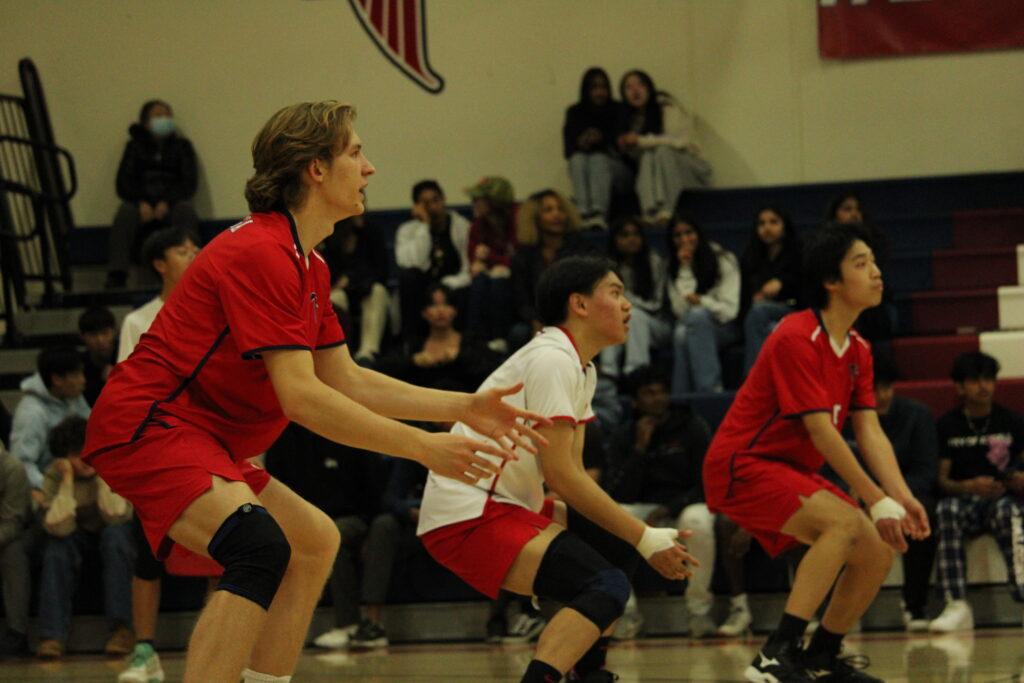 Middle Blocker senior Eric Norris prepares to receive a spike against Los Altos on March 13.