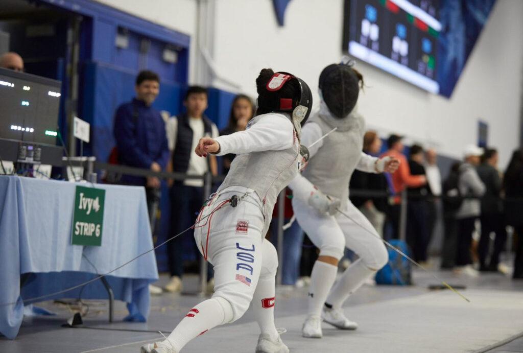 Lee fences with her opponent at the Ivies championships