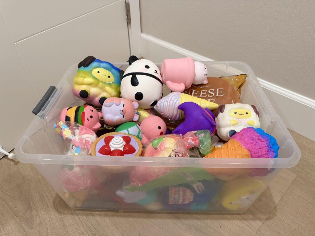 My box of squishies (usually hidden in the depths of my closet), emblematic of my playful childhood activities.