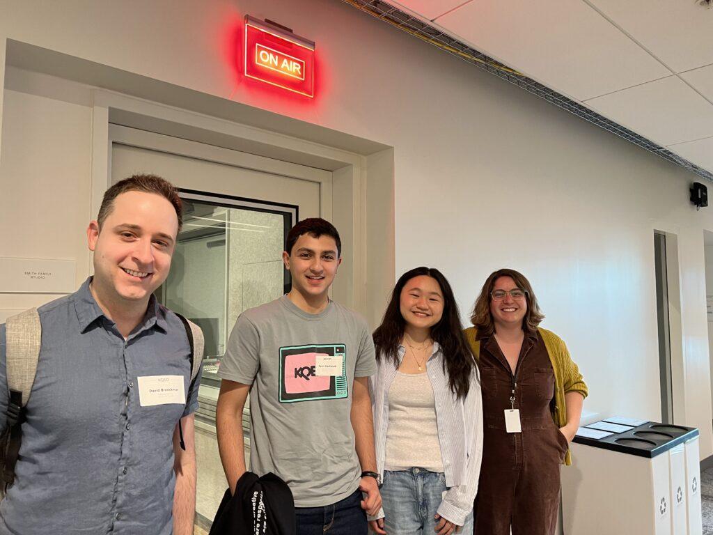(left to right) David Broockman, Ryan Heshmati, Kate Quach and Francesca Fenzi, KQED Forum member, pose in front of the recording studio.
