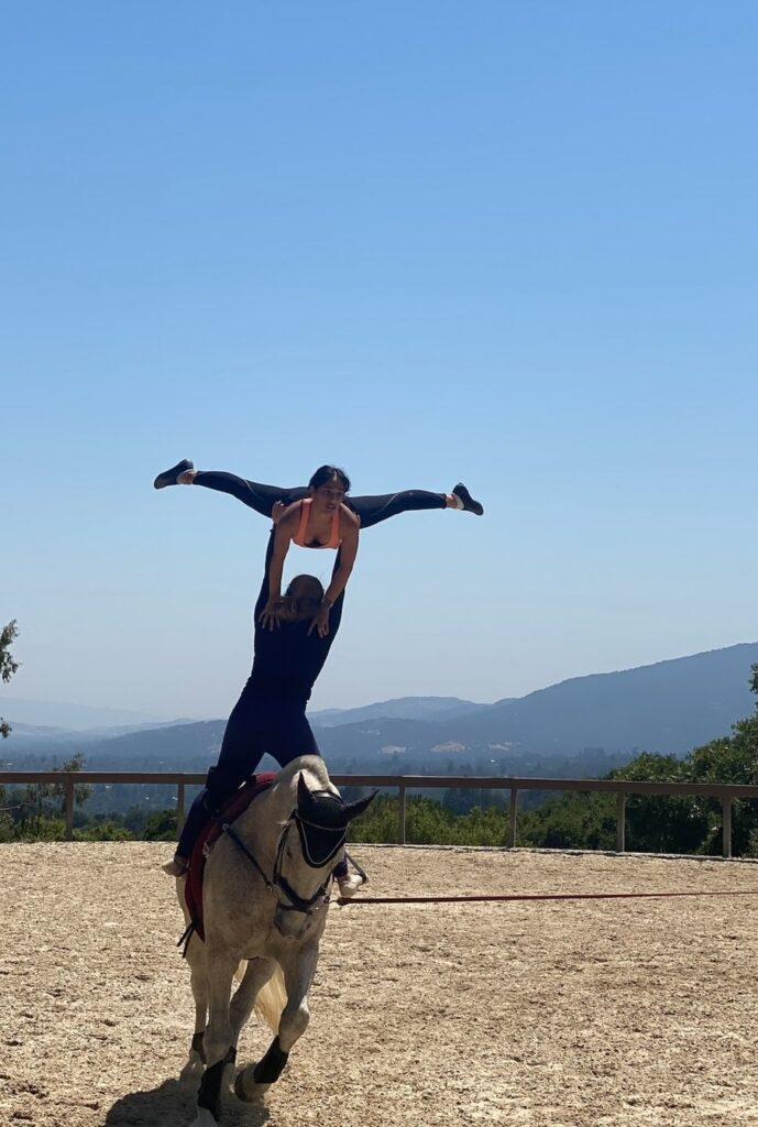 Maddy practicing lifting Vidhi for one of their stunts, preparing for their coming competition.