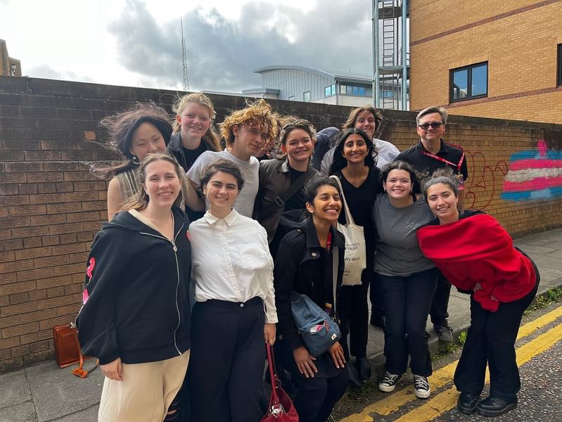 Drama students pose for a picture outside the Central Hall Studio. 