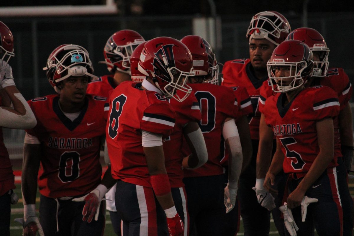 The Falcons take a brief water break to regroup and prepare to return to the field. 