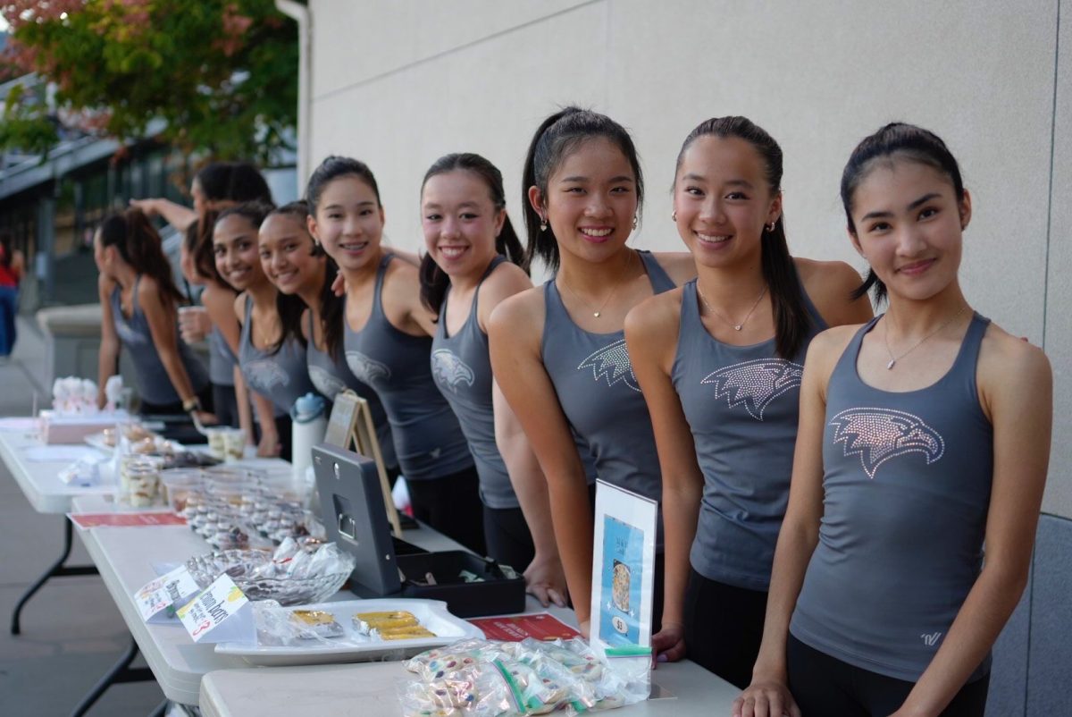 The dance team sells homemade baked goods at their bake sale at the Sept. 5 home football game against El Camino to fundraise for competition and costume costs.